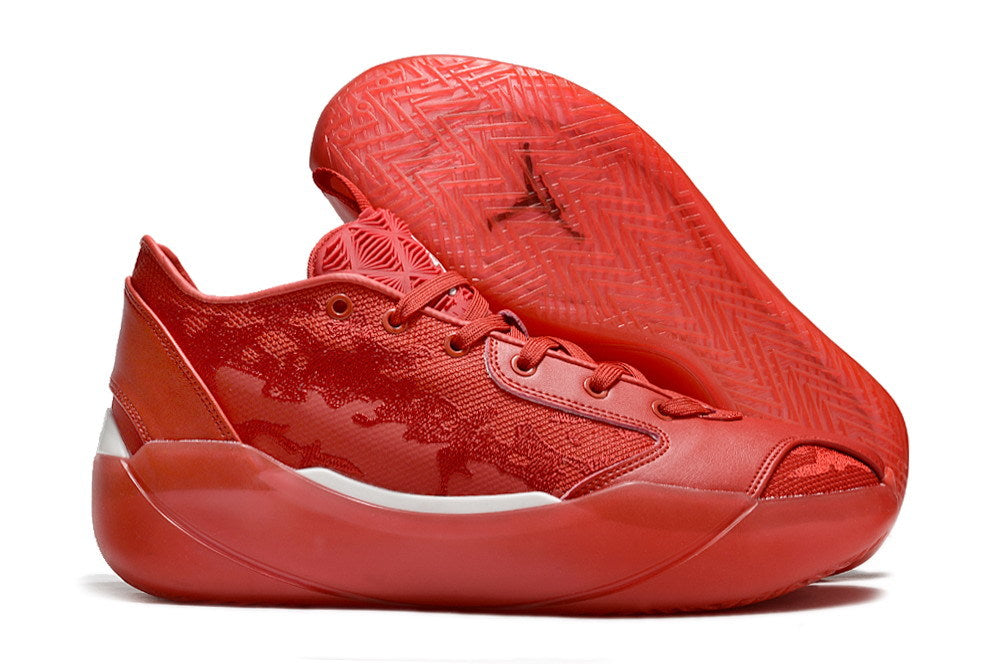 Side view of red Jordan Luka 39 shoes with outsole visible