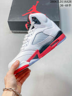 Side view highlighting the mesh panel, high-top collar, and red and black midsole accents