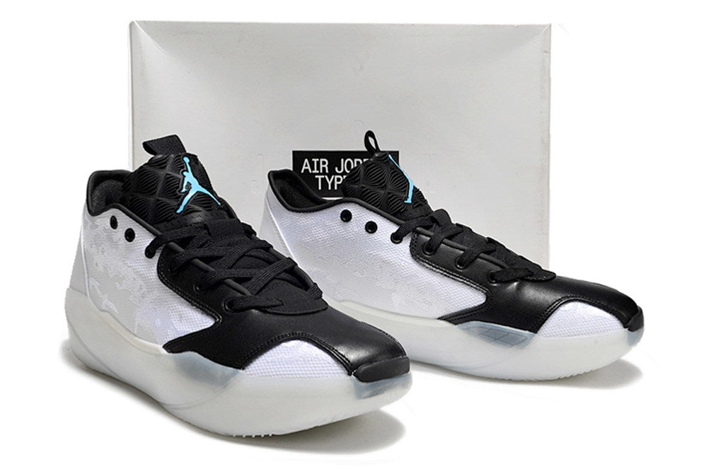 White and black Jordan Luka 39 shoes displayed in front of a shoebox