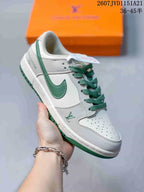Angled side view of the sneaker showing the white textured upper, green Swoosh, green outsole, and visible decorative heel lettering.