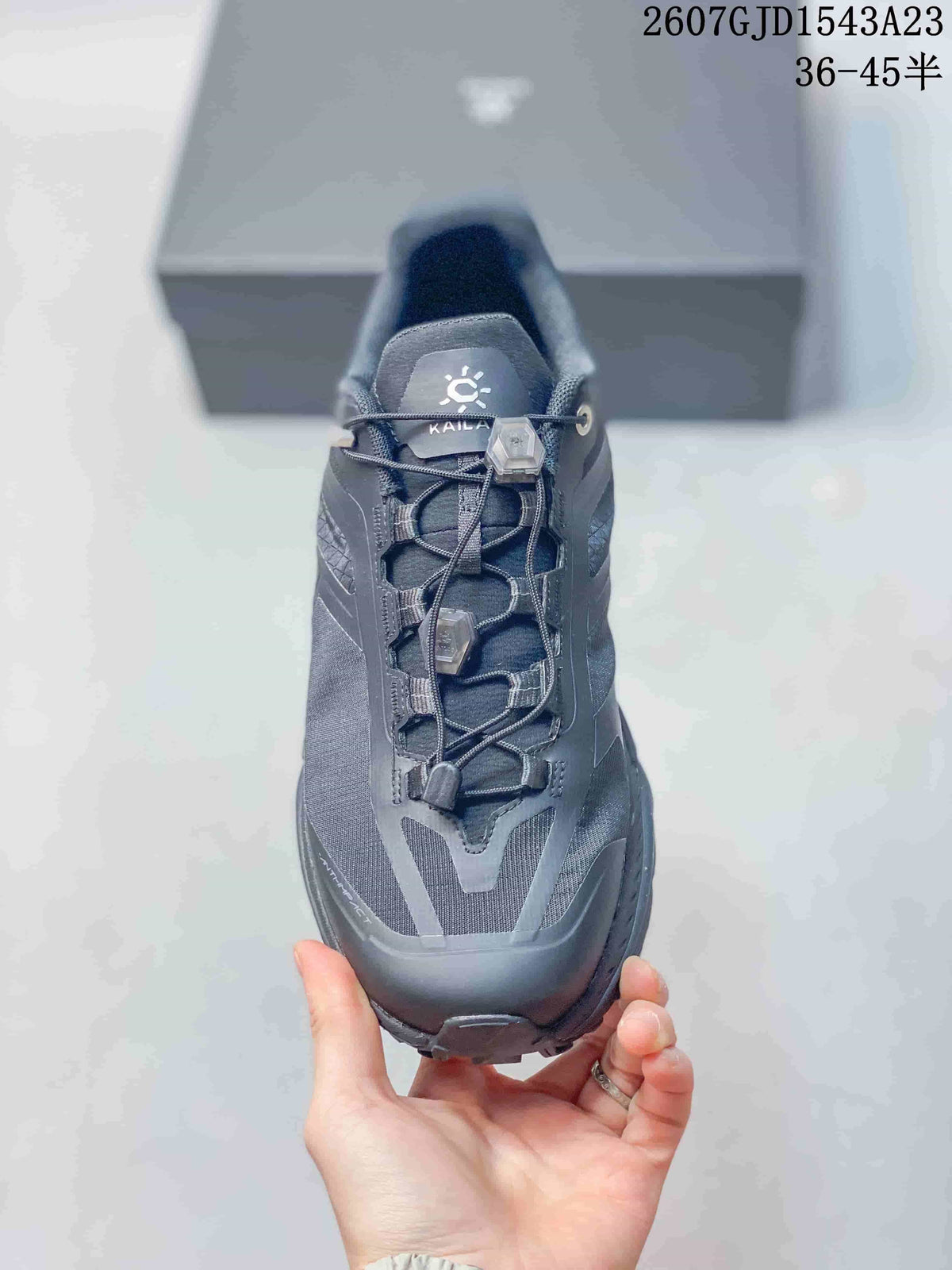 Top view showing the mesh toe area, lace-and-toggle closure, and padded tongue.