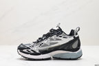 Single sneaker in profile showing the grey mesh upper, black overlays, white graphics, and pale blue-grey sole.