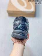 Rear view of a black and gray ASICS sneaker showing the padded heel area, heel branding, and layered sole construction; image text shows style code 2607JYD1549A19 and size range 39–47.5.