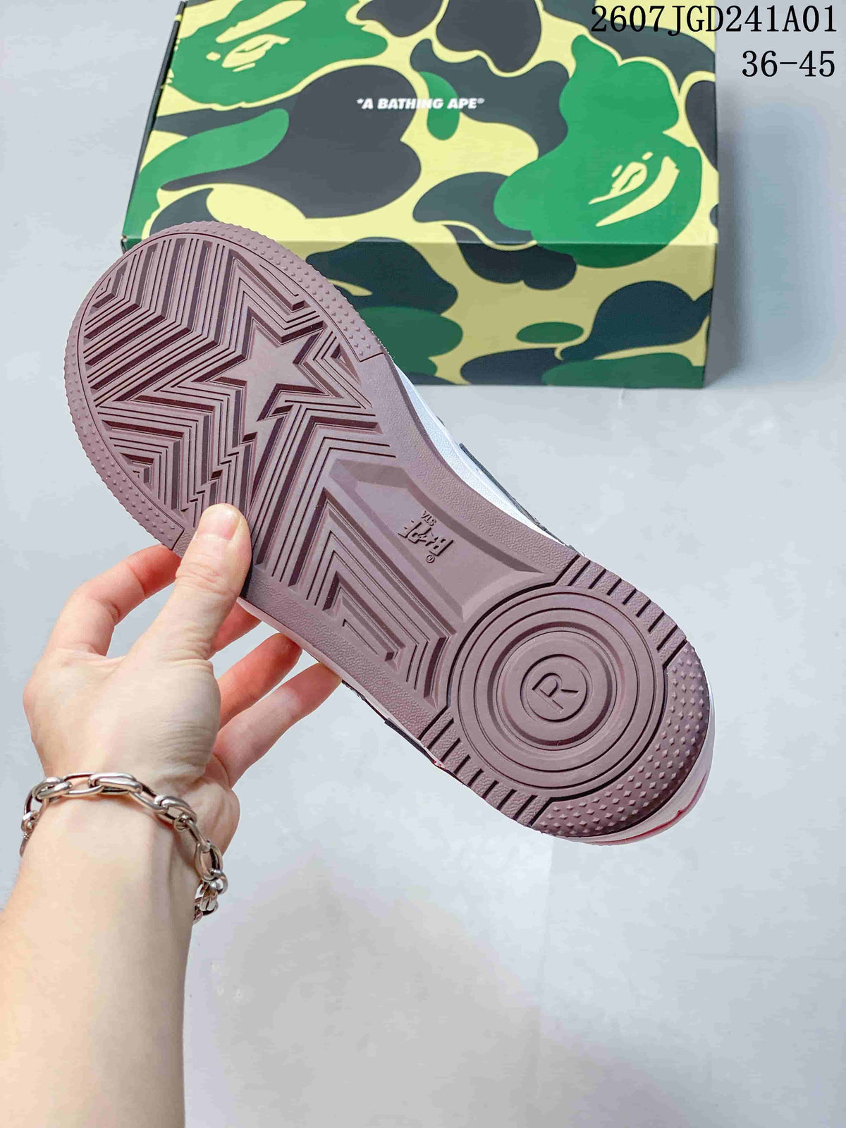 Mauve-colored outsole with patterned tread, shown beside a camouflage-patterned shoe box