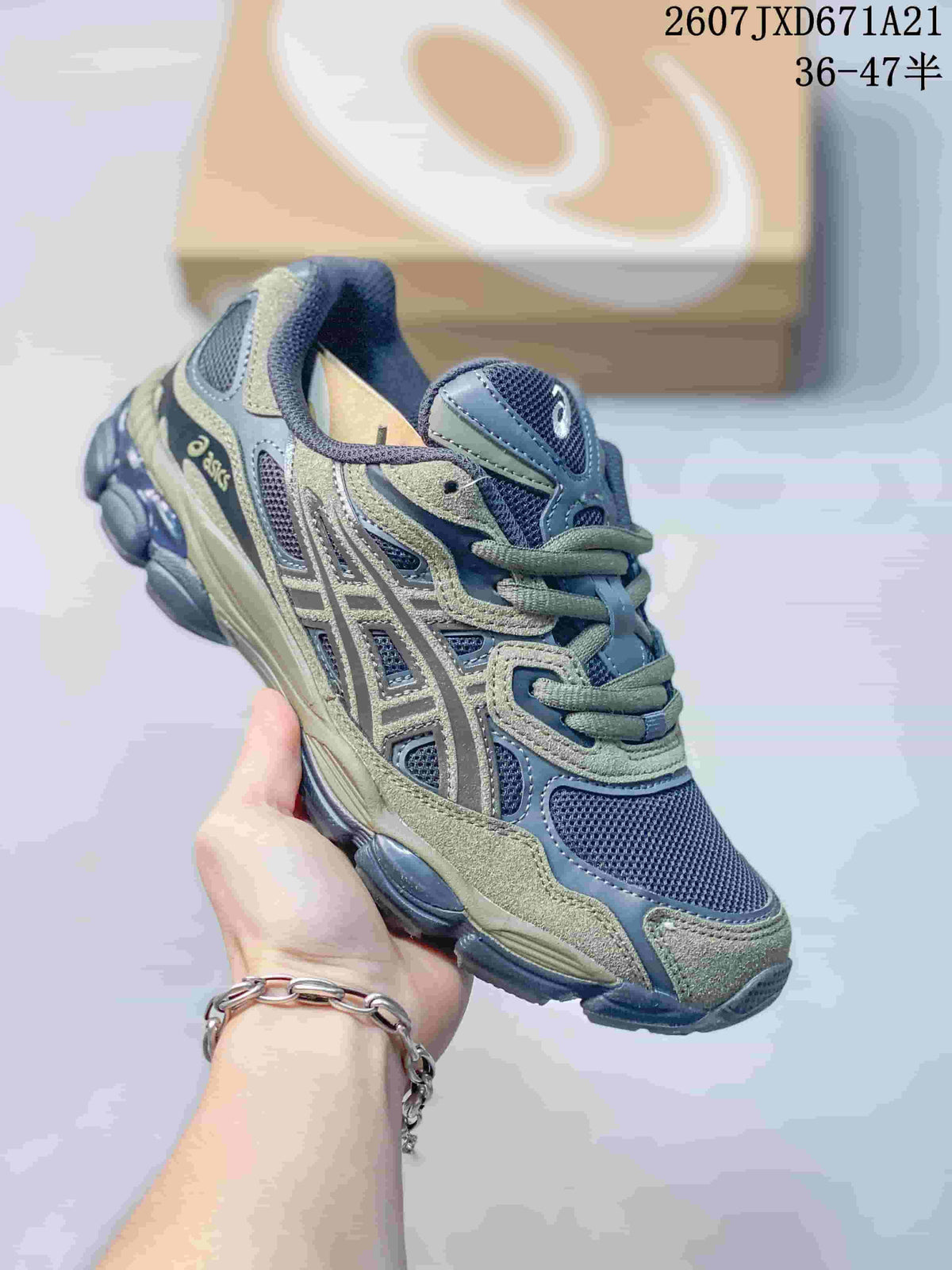 Olive and navy ASICS GEL-Kayano 14 sneaker shown from a front three-quarter angle.