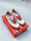 Pair of Nike Terra Manta Suede sneakers in cream, tan and red, displayed on a red shoe box; model code and size range are overlaid.