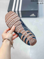 Close view of the patterned tan rubber outsole and tread design on a Ghost Sprint sneaker.