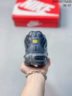 Rear view of the black sneaker showing the heel Air unit and TN branding.