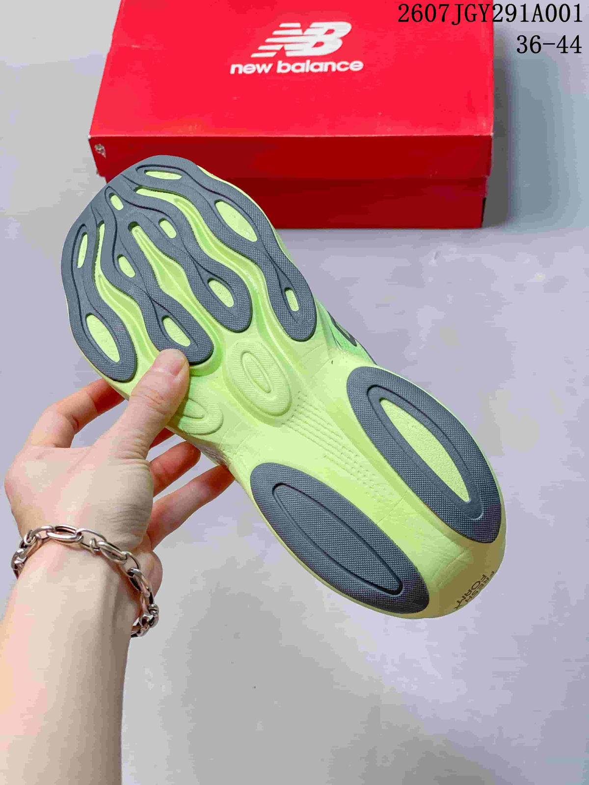 Underside of a lime running shoe showing gray outsole sections