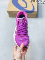 Top view showing the purple mesh-style upper, laces, toe ventilation details, and white side branding.