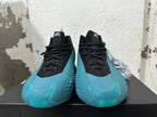 Front view of navy-blue and black high-top basketball shoes with black laces