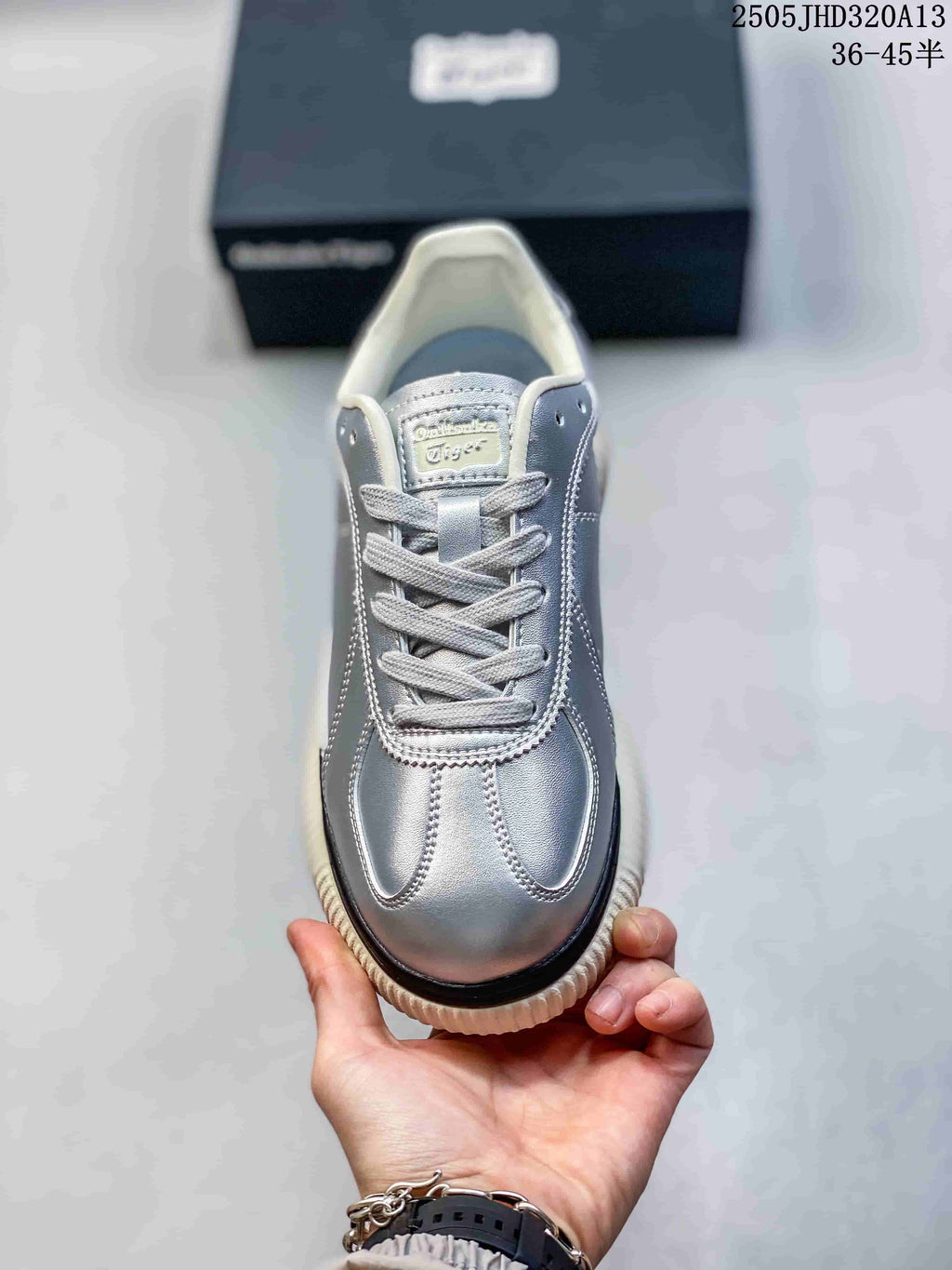 Front view showing the laces and metallic silver toe