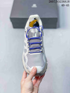 Top view of the hiking shoe showing the mesh tongue, blue lacing system, and reinforced toe area.
