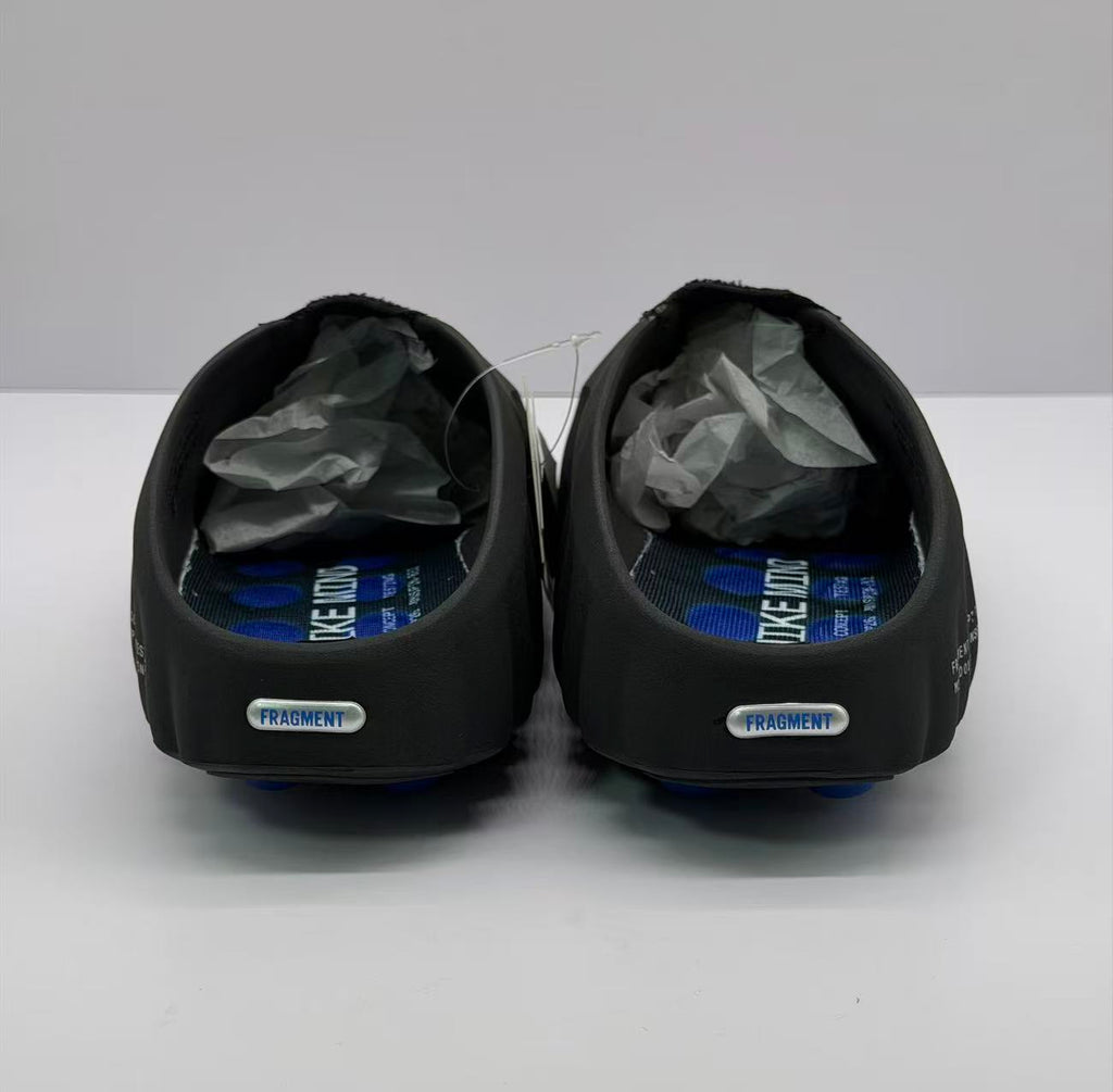 Front view of the pair showing the rear plaques marked Fragment and the blue-and-black footbeds.