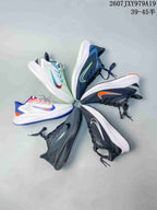 Flat lay showing six Nike running sneakers in different colorways arranged in a circular layout.