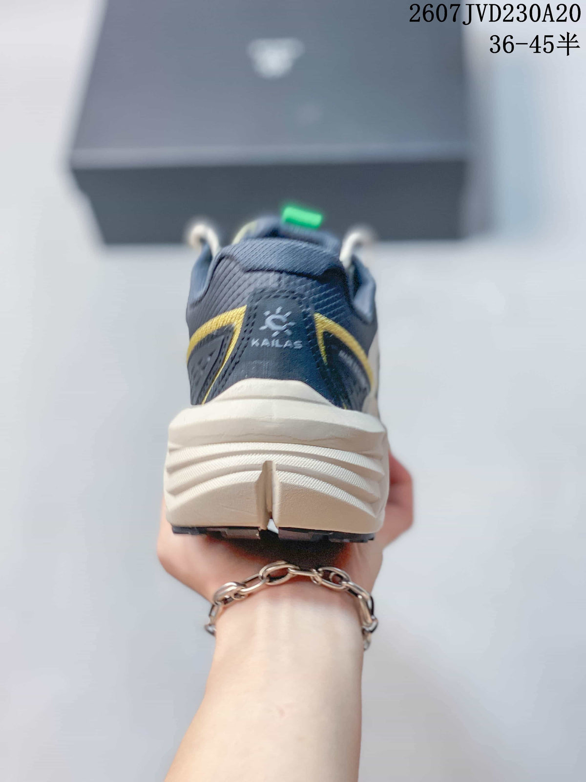 Rear view of the shoe showing the padded collar, KAILAS branding and layered heel design.