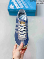 Top view showing the white laces, metallic eyelets, tongue branding, and stitched toe panel.