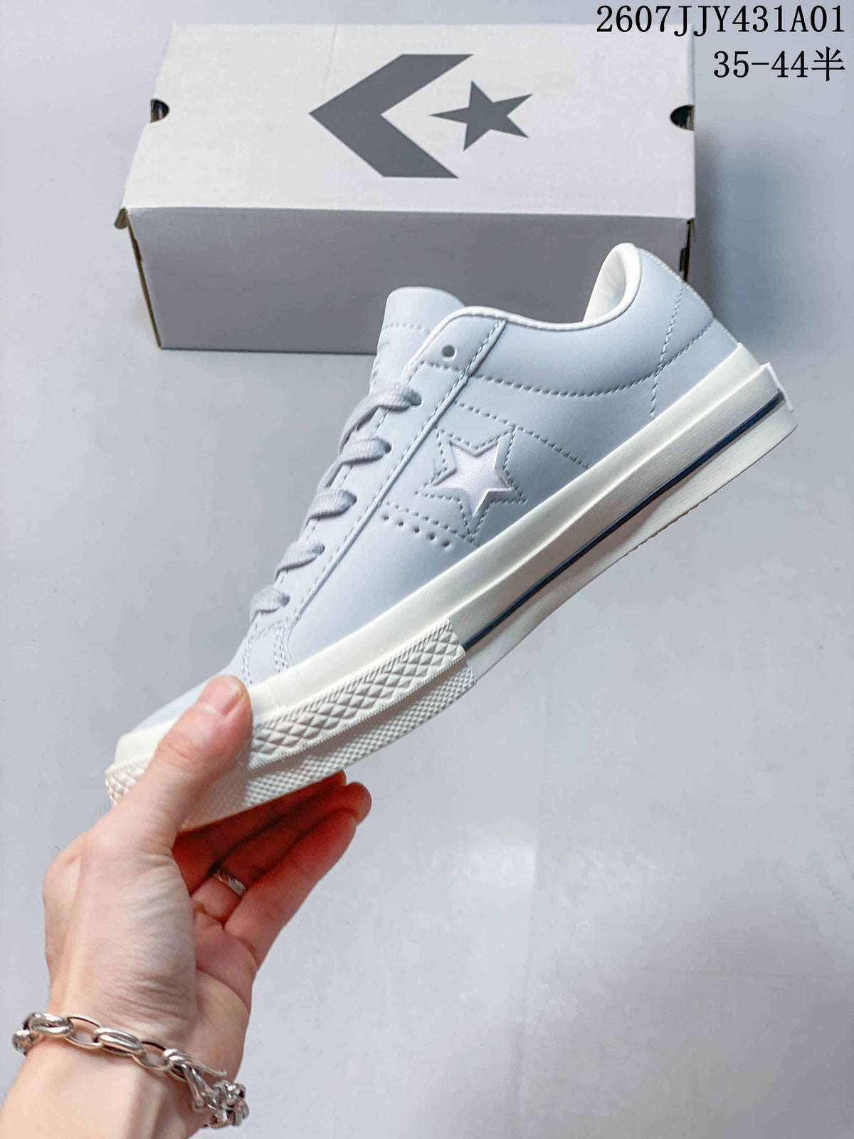 Side profile showing the tonal star detail and off-white sole
