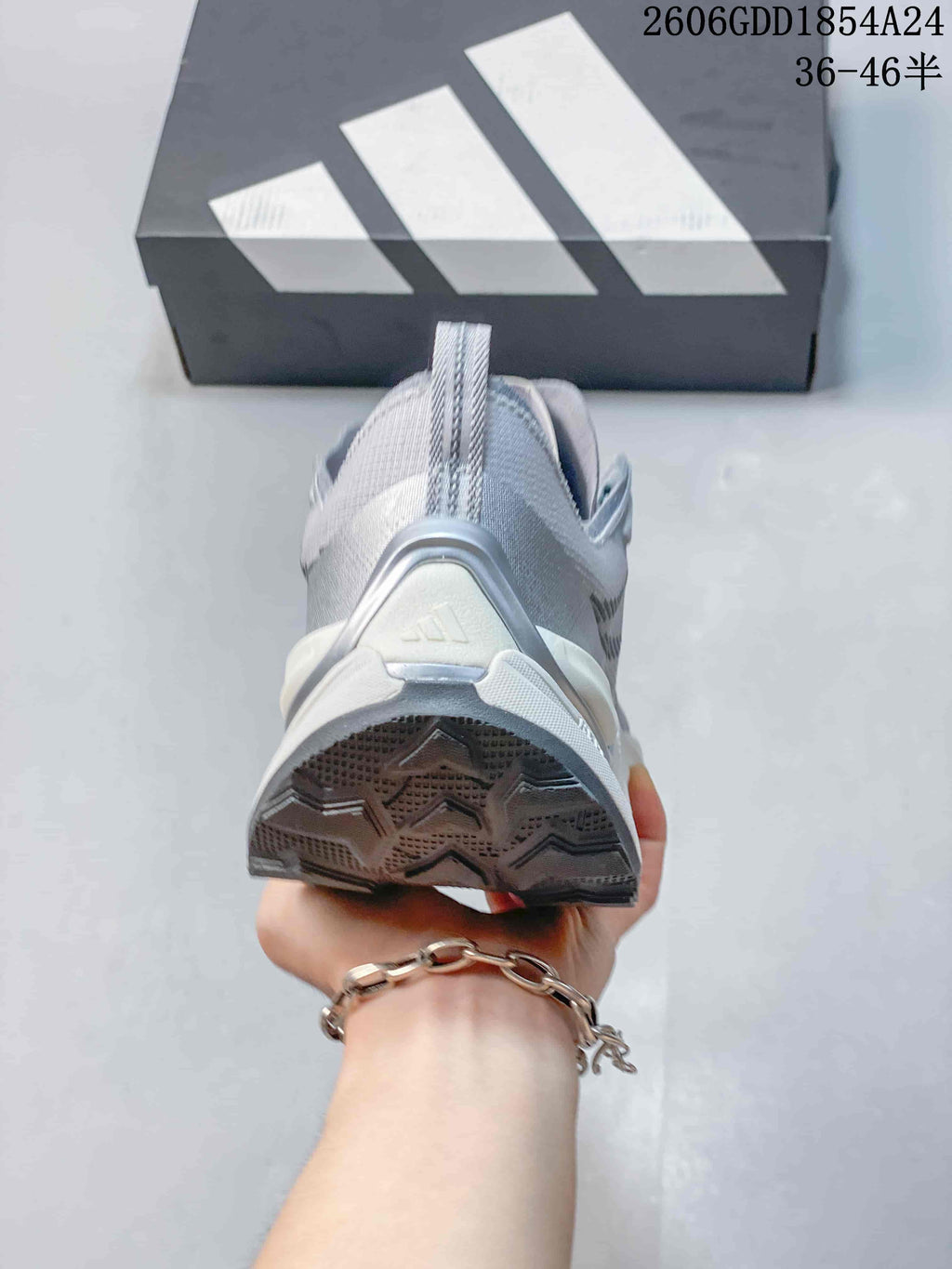 Rear view of an Adidas Holo Peak trail running shoe showing the heel and outsole