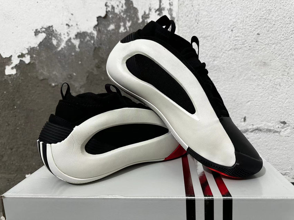Basketball shoes arranged to show their side profile and outsole
