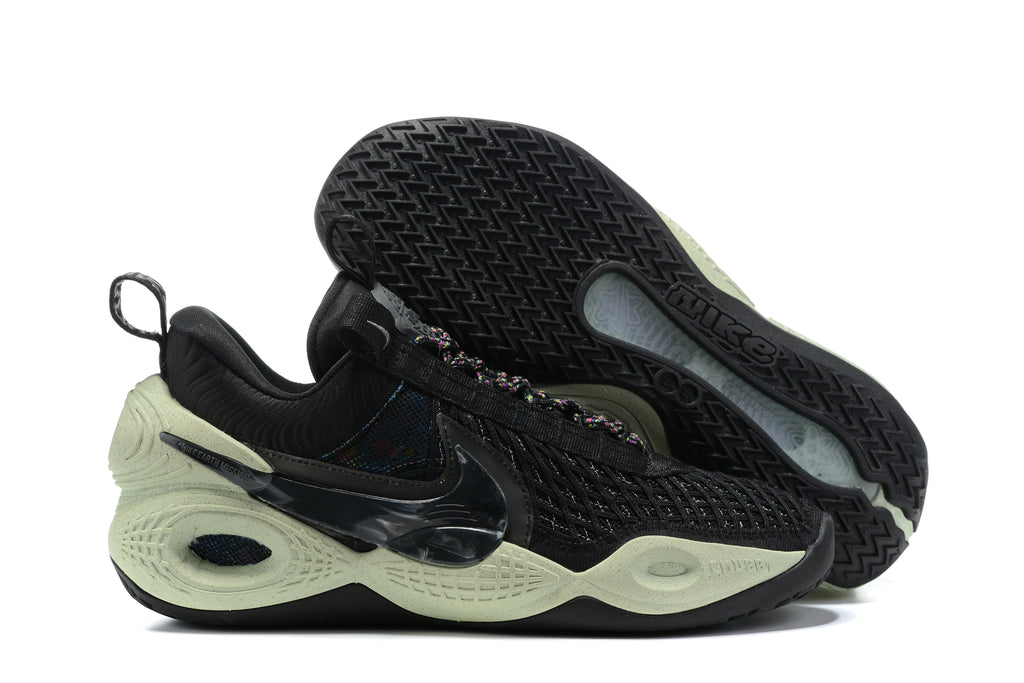 Black Nike Anthony basketball shoes with pale green soles and dark side details.