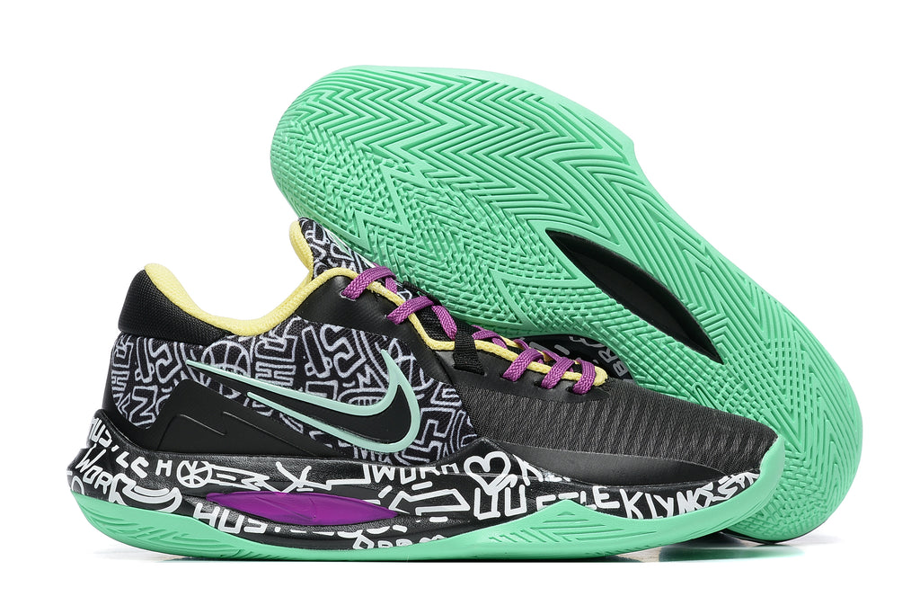 Black basketball shoe with mint green outsole, purple laces, and graphic print.