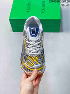 Front view of the sneaker showing its lace-up closure and patterned upper