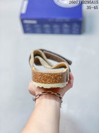Rear view showing the open heel, cork-look midsole and textured outsole.
