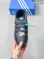 Top view of the black adidas Originals ANFU MJ sneaker showing its three straps and rounded toe