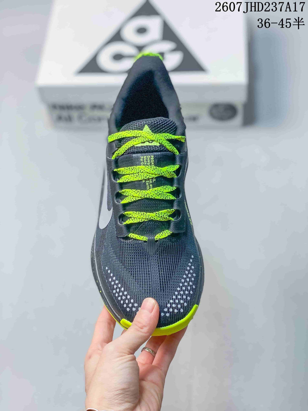 Top view showing the lime laces, dark gray tongue, and dotted forefoot detailing.