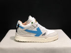 Opposite side profile showing the blue arrow detail, black heel pull element, and white layered upper.