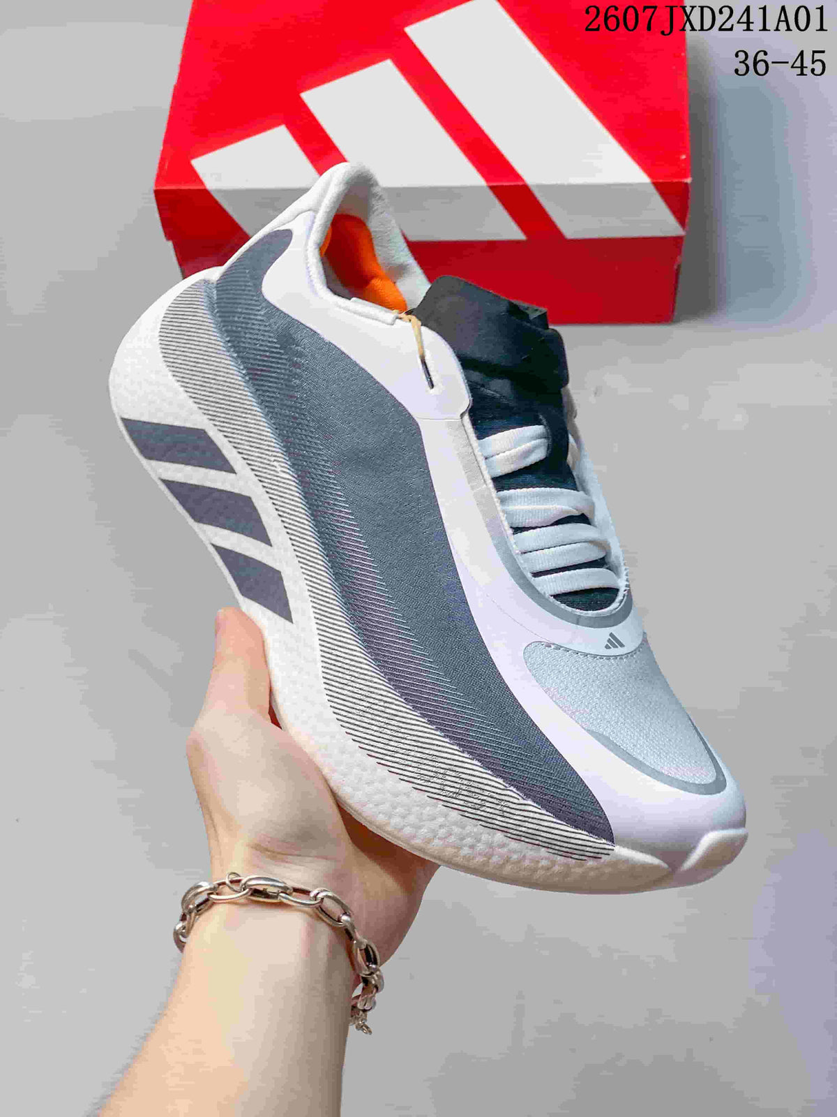 Angled side view highlighting the white and gray upper and ridged sole