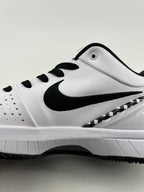 Side view of the shoe showing the Swoosh and checkerboard heel accent
