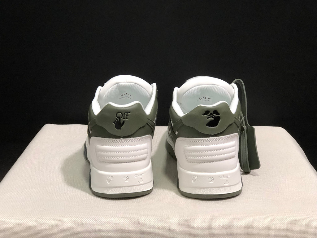 Rear view showing padded heel panels, printed heel details, and the dark outsole edge.