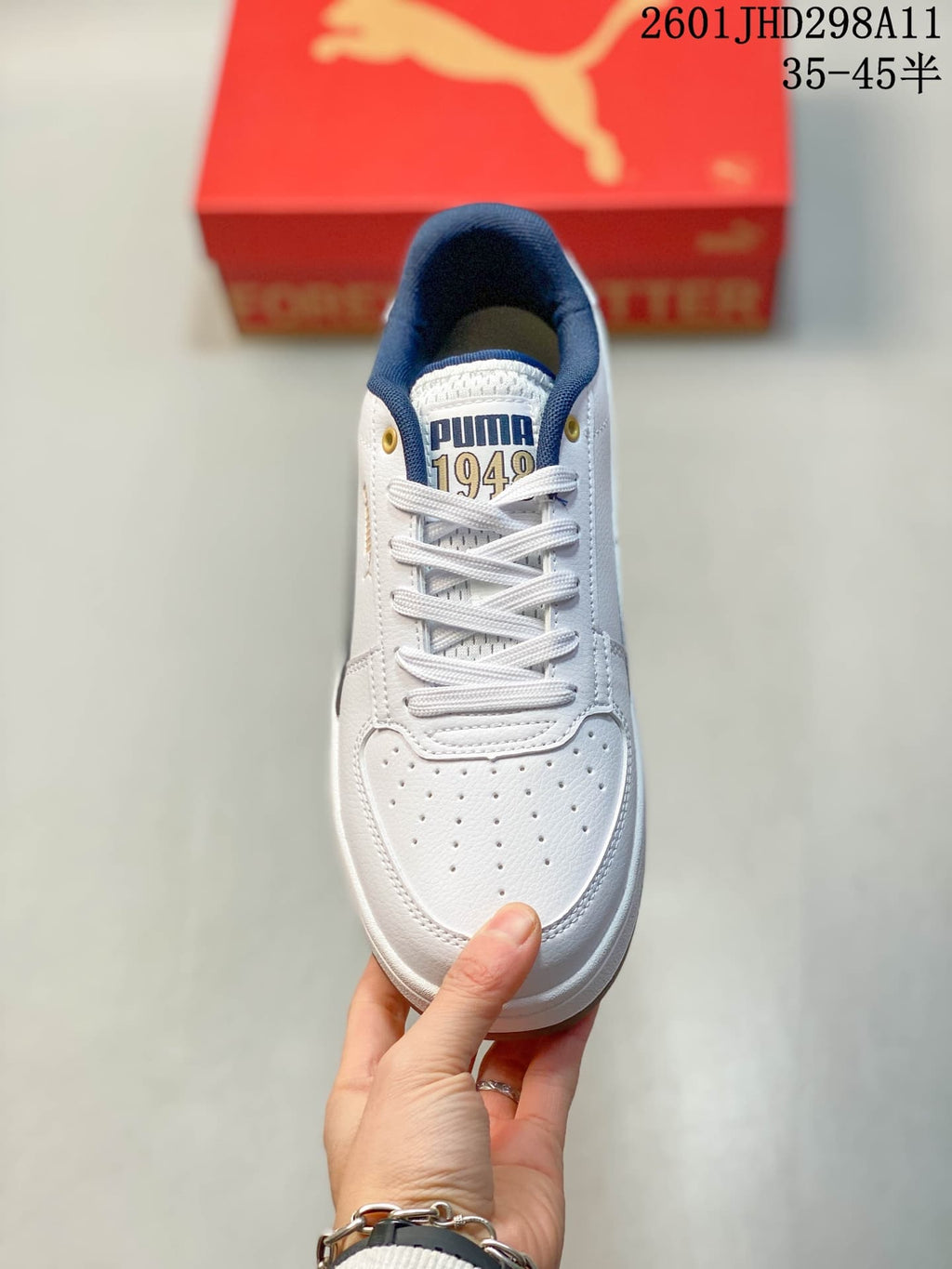 Top view showing the perforated toe, white laces and Puma tongue branding.