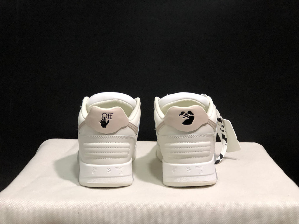 Rear view showing padded heel panels, black heel graphics, and white outsole construction.