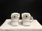 Rear view showing padded heel panels, black heel graphics, and white outsole construction.