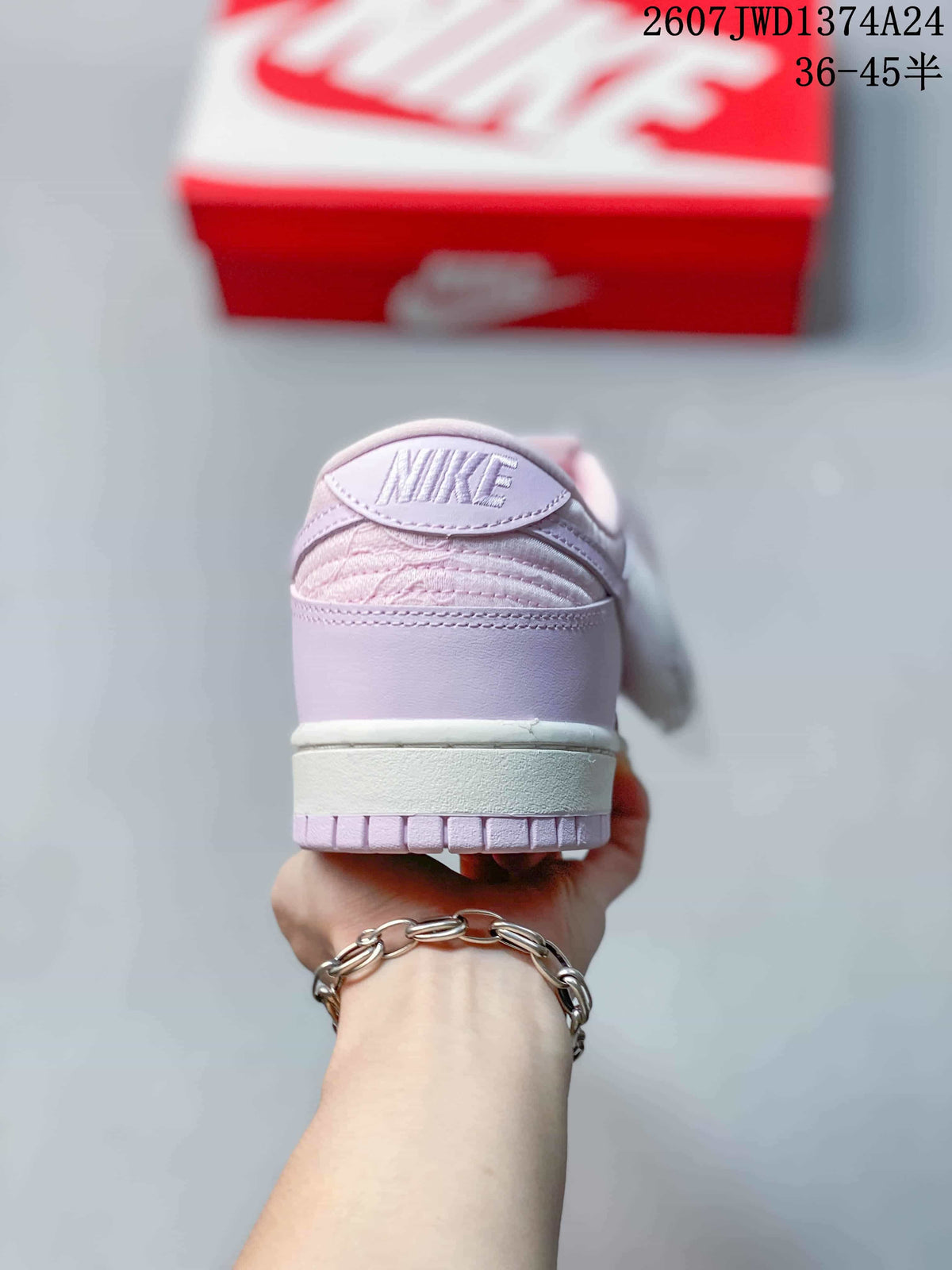 Rear view showing the padded collar, heel branding, and layered outsole.