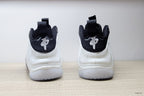 Rear view of white and black Nike Little Posite One GS sneakers