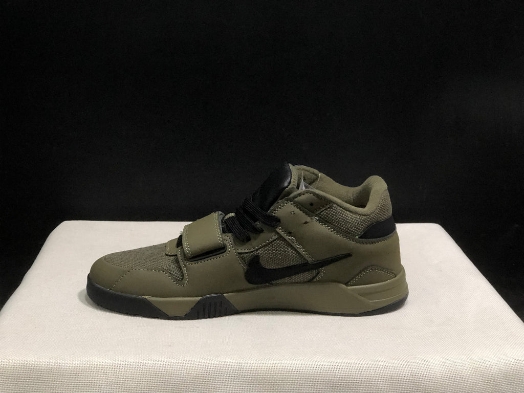 Side profile showing the black Swoosh, olive upper, padded collar, and raised outsole structure.