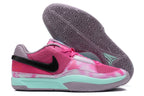 Pink Nike Ja 1 shoes with lavender and mint accents.