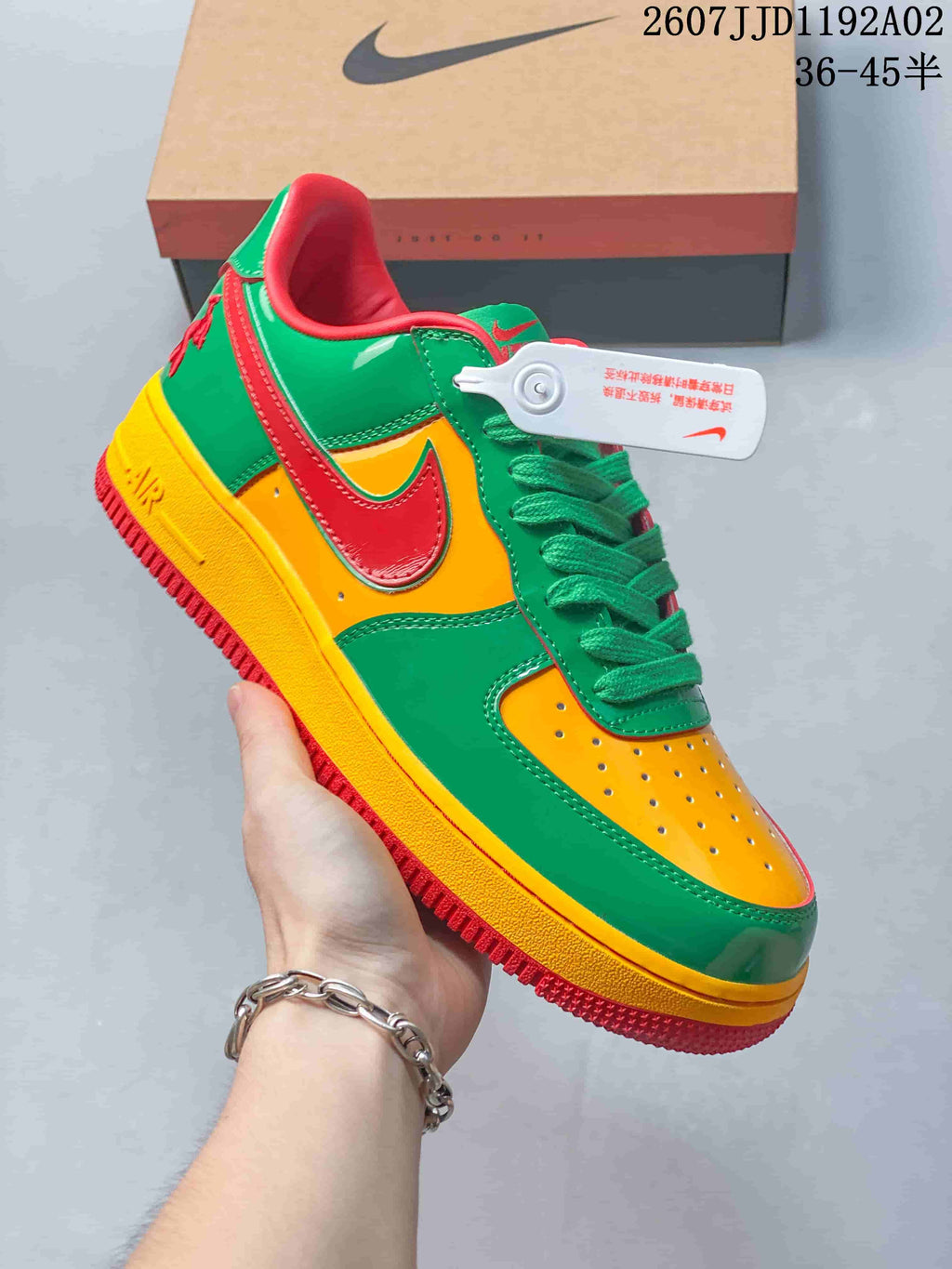 Angled side view of the green, yellow, and red sneaker