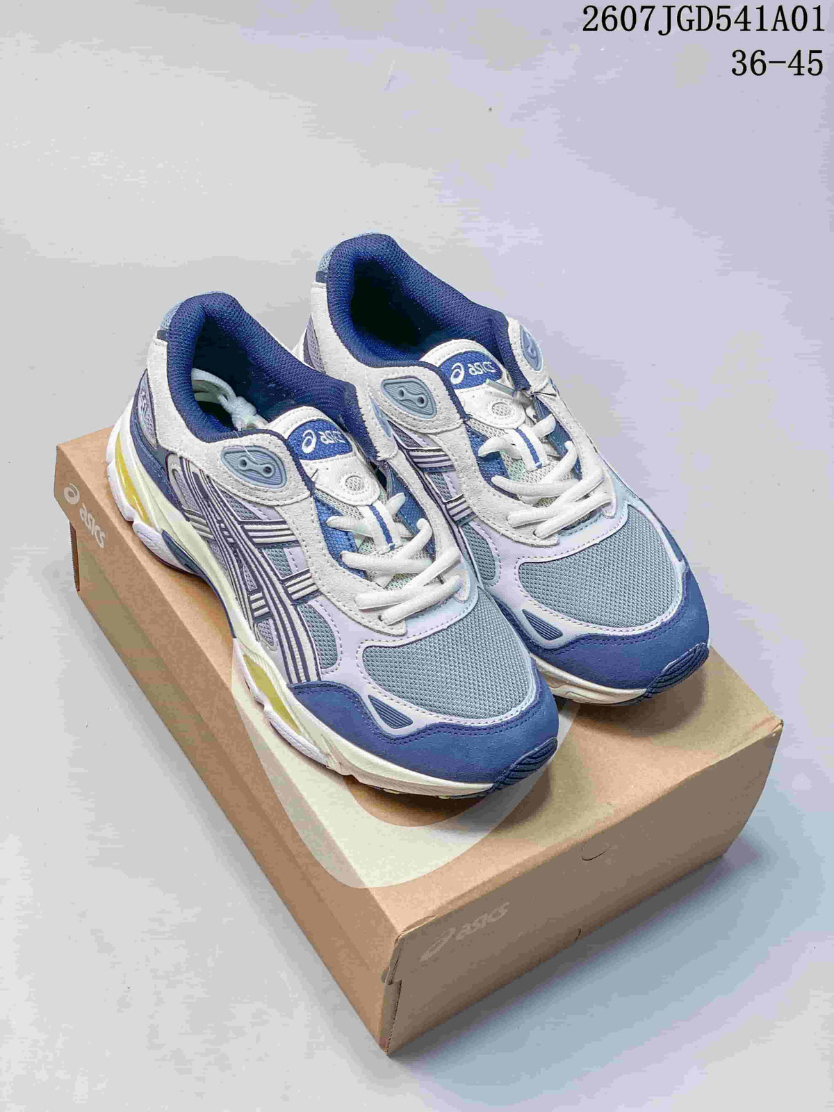 Pair of blue, gray, and white ASICS GEL-NYC 2.0 sneakers on a shoe box