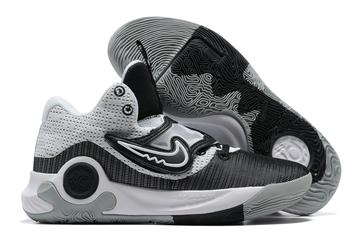Gray, white, and black Nike KD basketball shoes with a patterned outsole.
