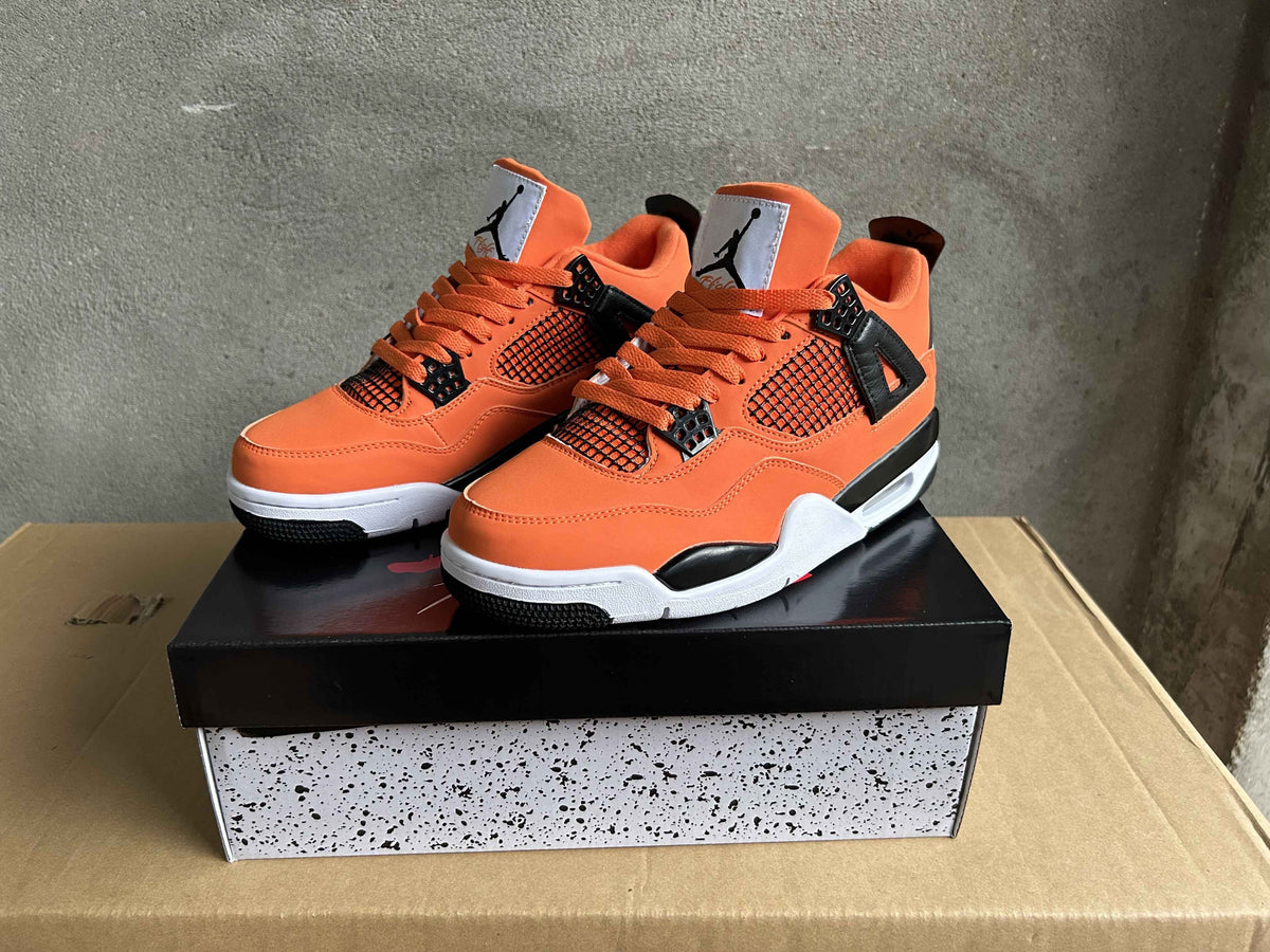 Jordan Air Jordan 4 Orange and Black Sneakers