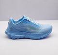 Side view of a light blue Alo sneaker showing the textured upper, layered side detail and sculpted sole.