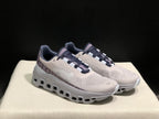 Pair of silver-gray and purple On Cloud X sneakers viewed from the front and side
