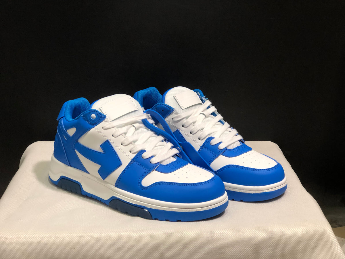 Front three-quarter view of the blue and white sneaker pair.