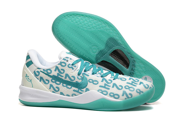 White and teal Kobe 8 Protro shoe with patterned outsole shown.