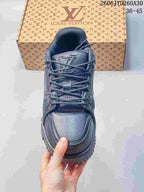 Top view of the lace-up sneaker with a logo-decorated tongue